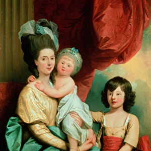 A group portrait of a lady and her two children