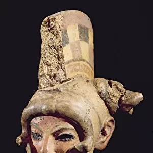 Head of a warrior wearing a helmet, from Satricum (painted clay)