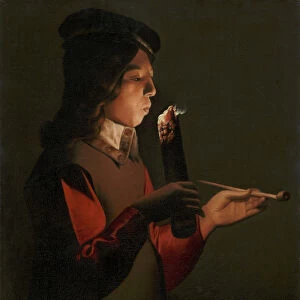Un jeune garcon avec une pipe, souffle sur un brandon - A young boy with a pipe