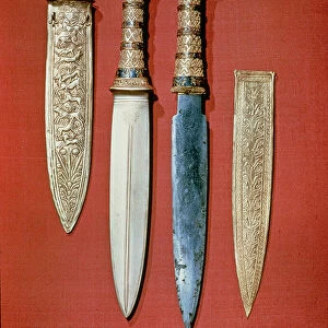 The kings two daggers, from the tomb of Tutankhamun (c