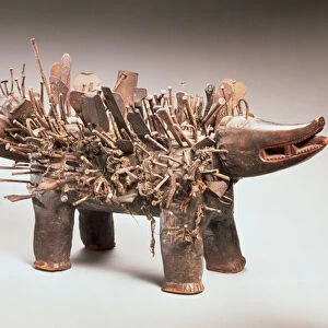 Kongo nkisi nkondi in the form of a two-headed dog, Kozo, from Cabinda (wood and iron)