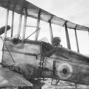 How Kut Garrison was fed by flying-machine: ready for flight with bags of grain