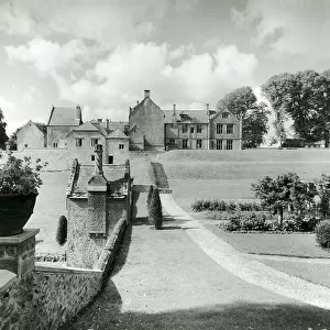 Mapperton, the east side of the house from the garden terraces, from 100 Favourite Houses (b/w photo)