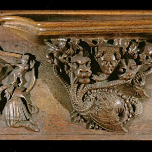 A misericord depicting an elaborately carved hydra, symbolic of the seven deadly sins