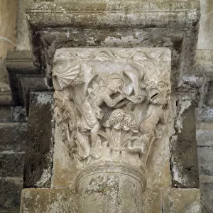 A musician and a demon symbolising lechery (carved capital)