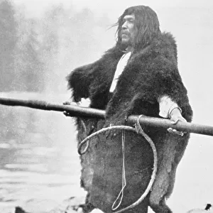 Nootka Indian with whaler harpoon, c. 1900 (b/w photo)