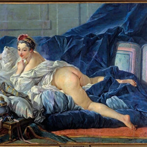 The odalisque Young Woman is sitting on a sofa. Painting by Francois Boucher (1703-1770