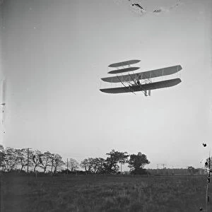 Orville Wright on Flight 46 at Huffman Prairie, Dayton, Ohio, 1905 (b/w photo)