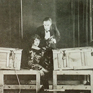 P T Selbit, the British magician, sawing a woman in two (photo)