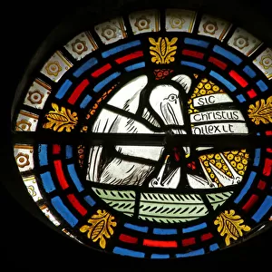 Pelican feeding her young (stained glass)