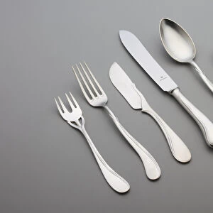 Six pieces of "Tulipan"flatware: 1 table knife, 1 table fork, 1 tablespoon