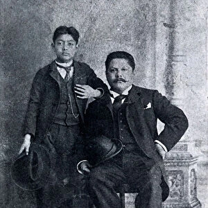 Portrait of Jose Guadalupe Posada (1852-1913), engraver and illustrator of Mexican periodical and flying leaves with political, moral and social themes, posing here with his son (b / w photo)