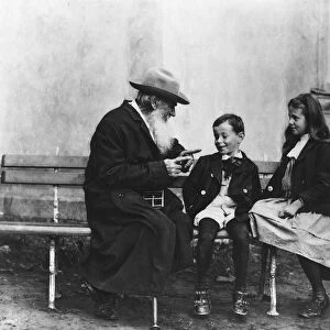 Portrait of Lev Nikolaevich Tolstoy (1828-1910) with his Grandchildren (b / w photo)