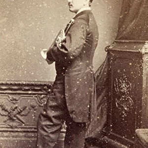 Portrait of Levey holding a trumpet, 1860s (b/w photo)