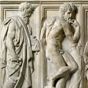 Prophete and Ignudo, 1555. (Low marble relief)