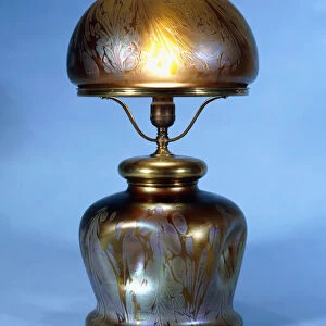 A rare Loetz brass mounted table lamp (glass with gold metallic lustre and bronze)