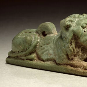 Recumbent lion amulet (green faience)