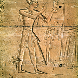 Relief depicting Tuthmosis III (c. 1479-1425 BC) making an offering to a seated god