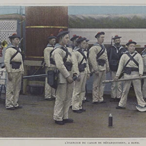 Sailors carrying out an exercise with a landing gun on board a ship (colour photo)