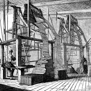 Silkworkers in a workshop in Lyon using a Jacquard loom, c. 1880 (engraving)