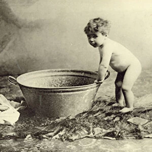 Small boy getting ready for his bath (b / w photo)