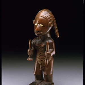 Standing male figure, Bembe people, 19th-20th century (wood & ivory)