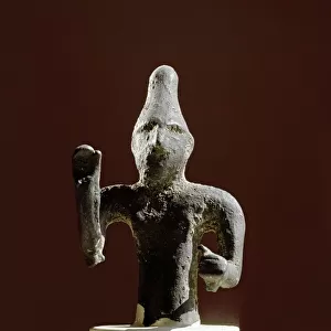 Statuette of Punic god in geometric style, 8th century BC (bronze sculpture)