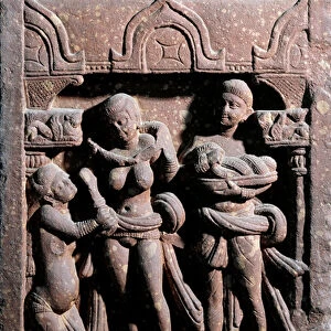 Sundarananda (Nanda) helping Sundari at her toilet. Kushan period, 1st century (relief)
