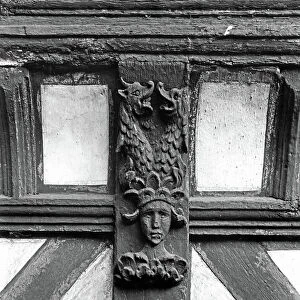Detail of a supporting bracket on the gatehouse range, Little Moreton Hall, Cheshire, from The English Country House (b/w photo)