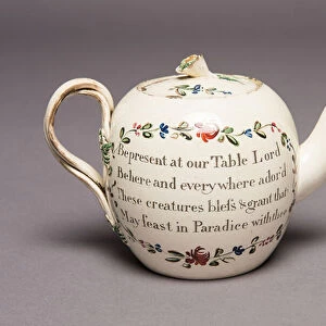 Teapot with Christian inscription, early 19th century (creamware)