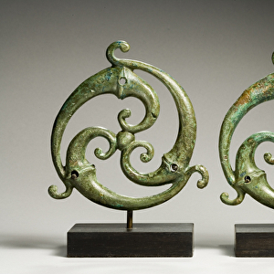 Triskele appliques, Romano-Celtic, c. 3rd century AD (bronze)