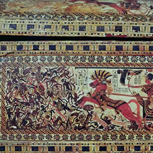 Tutankhamun (c. 1370-1352 BC) on his chariot attacking Africans