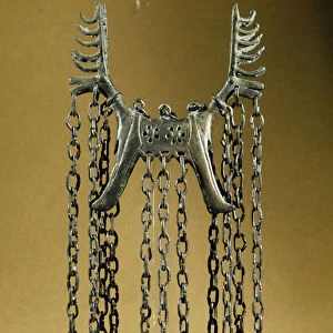 Two-headed moose shaped pendant, from Dolanlar, bronze age (metal)