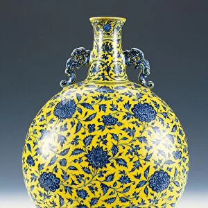 An underglaze blue and yellow enamelled moonflask with a peony and lotus pattern, c