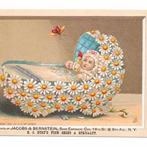 A Victorian trade advertising card of a baby in a crib decorated with daisies holding a