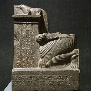 Votive statue representing Mayi offering the figure of a crocodile to Sobek, new kingdom, from Dahamsha (black granite)