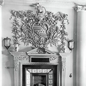 The western chimneypiece in the hall, Buxted Park, Sussex, from The English Country House (b/w photo)
