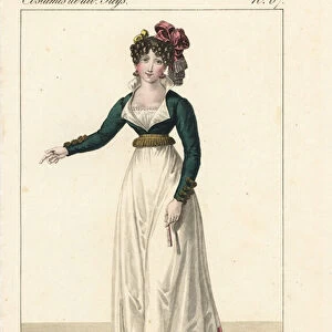 Woman in costume of Seville, Spain, 19th century. Hair in ringlets, a short jacket with open collar, and high-waisted skirt. Handcoloured copperplate engraving by Georges Jacques Gatine after an illustration by Louis Marie Lante from Costumes of