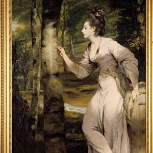 A woman of great elegance gives a name on a tree trunk in a romantic atmosphere