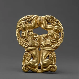 Xiongnu Belt buckle with paired felines attacking ibexes, c. 3rd-2nd century BC (gold)