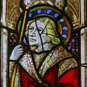 Young saint with unusual halo (stained glass)