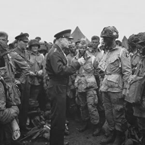 General Dwight D. Eisenhower talking with soldiers of the 101st Airborne Division