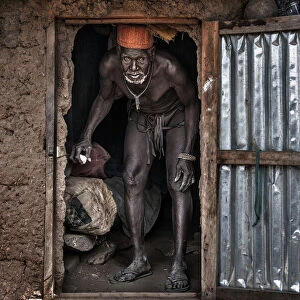 The village chief leaving his home - Benin