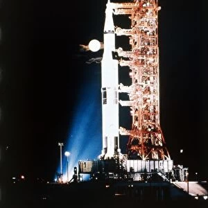 Apollo 9 Saturn V rocket with full moon, 1969. Creator: NASA