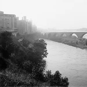 Minneapolis, view from across river, between 1880 and 1899. Creator: Unknown