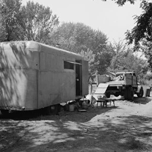 Possibly: The house trailer and the youngest little girl, Washington, Yakima Valley, Toppenish, 1939 Creator: Dorothea Lange