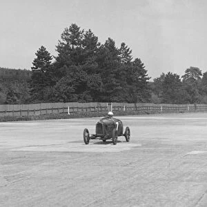 Two Salmson cars taking the chequered flag at Brooklands. Artist: Bill Brunell