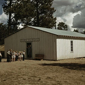 The school at Pie Town, New Mexico in the Farm Bureau building, 1940. Creator: Russell Lee