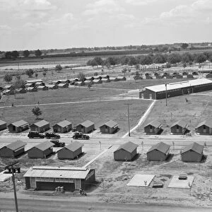 View of FSA camp Farmersville seen from water tower, Tulare County, California, 1939. Creator: Dorothea Lange
