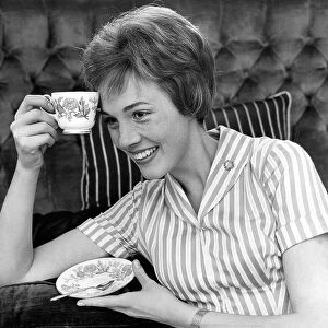 Julie Andrews with a cup of tea, 1960